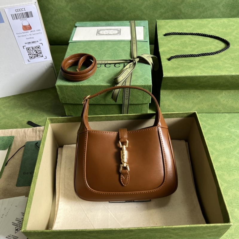G*u*i top handle bags